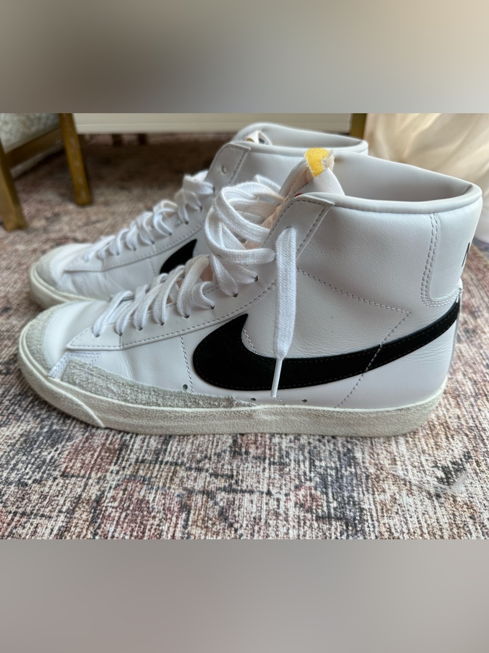 Nike Blazers White High-Top Sneakers with Black Swoosh and Yellow Tongue Tab